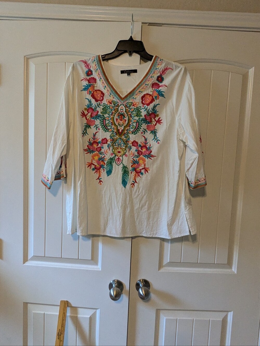 White Embroidered V-Neck Blouse with Floral Motif